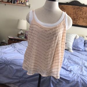 Fancy small beaded cream spaghetti strap shirt for a night out.